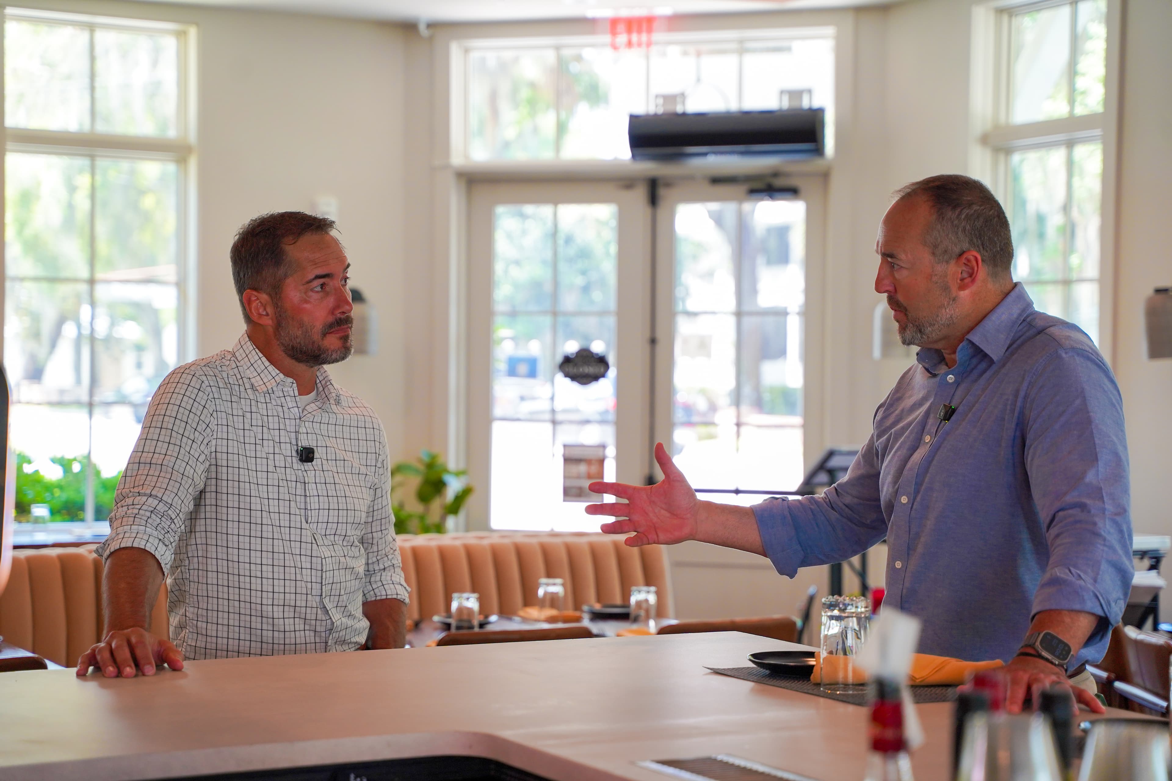 Matt Cunningham and Scott Songer discussing small-business decisions at The Bridge Collective