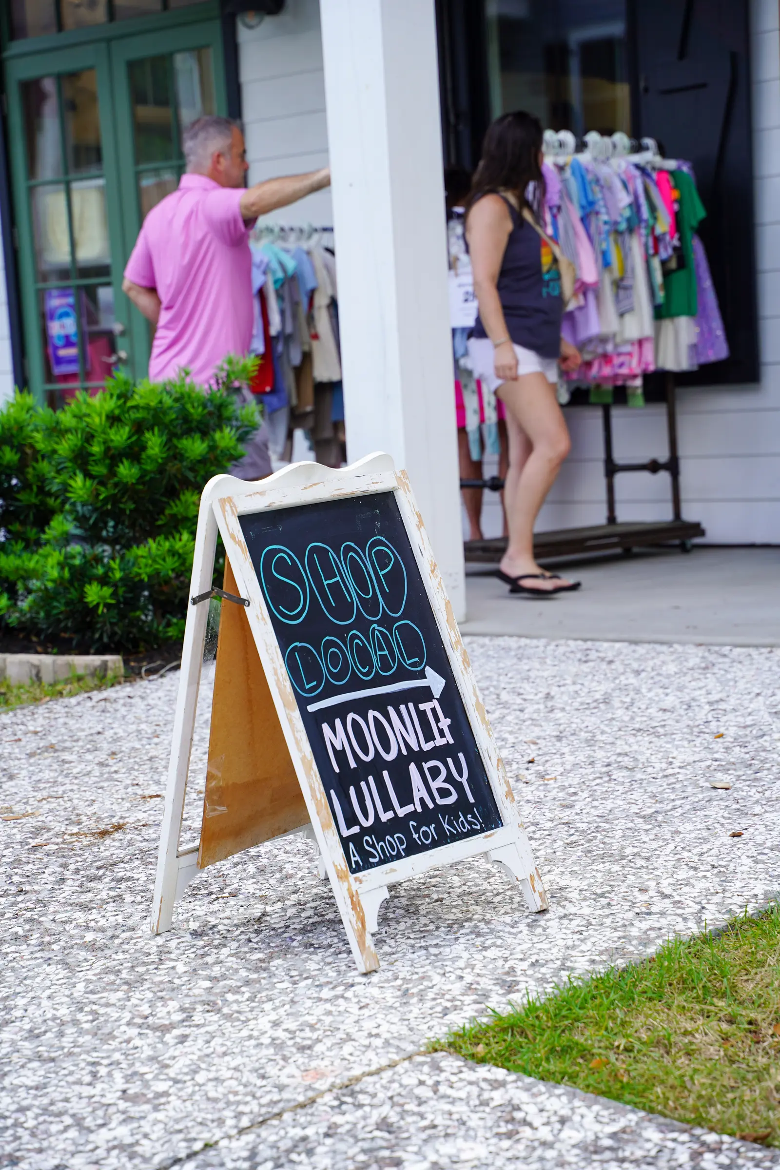 A Shop Local sign outside a small business in Bluffton